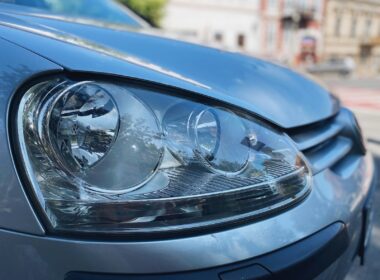 a close up of the headlights of a car